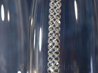    Swarovski "".  007.