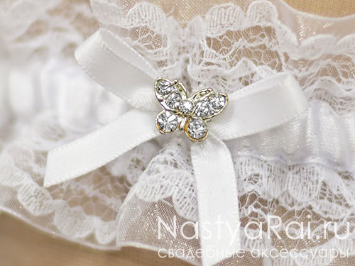 Фото. Свадебная подвязка с цветочком из страз.