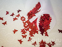 Конфетти красные бабочки. Фото 000.